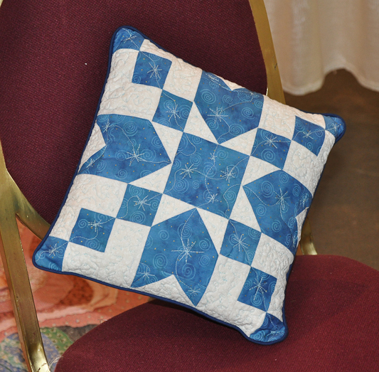 328. Rosana Swing • Two Snowflake Pillows