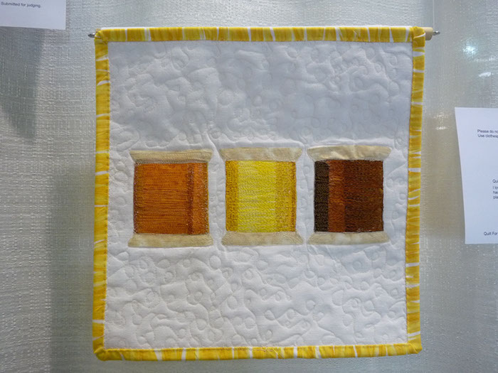 E10a Mary Maxwell Playing with Thread